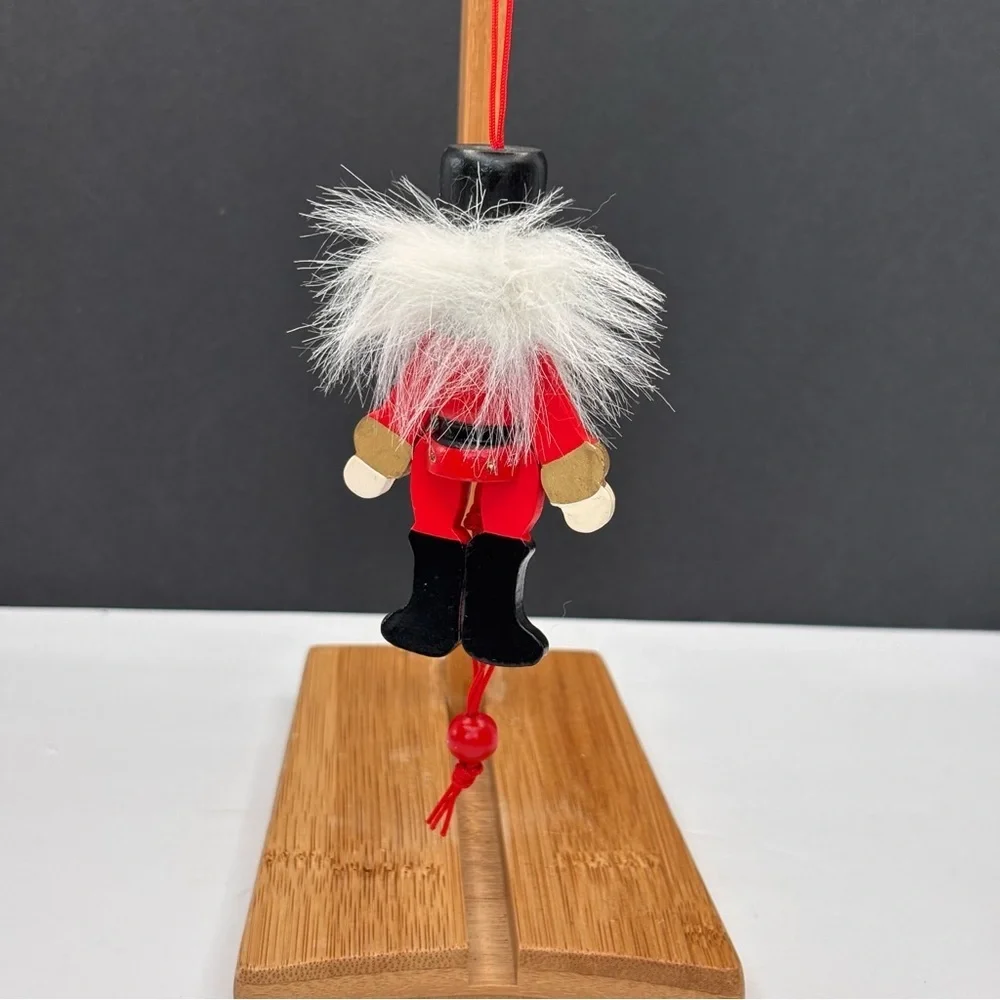 Vtg wood articulating pull string nutcracker & (1) Plastic Nutcracker Ornament